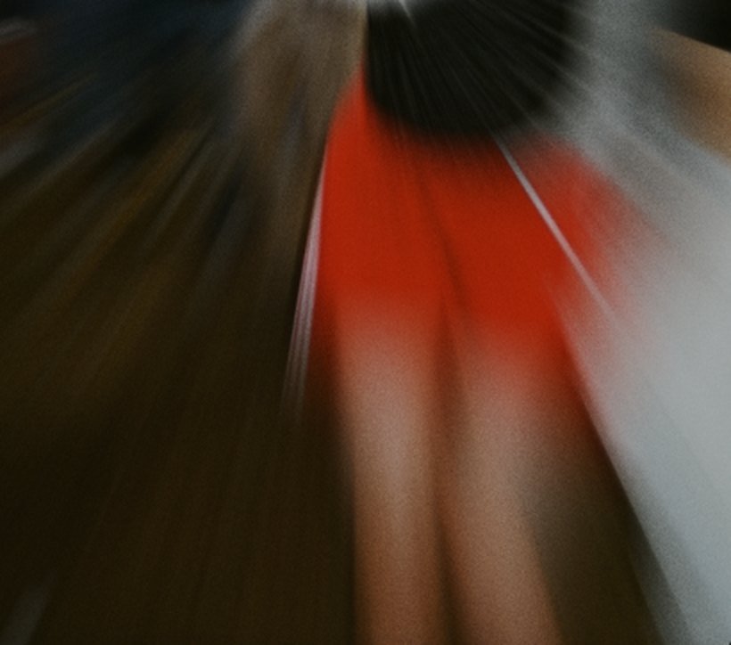 A crowd dissolving into motion blur.